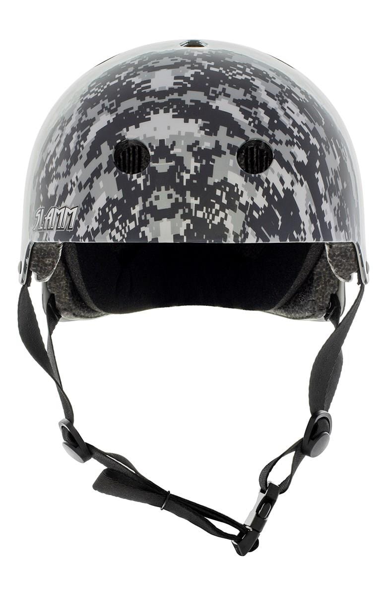 The Slamm Logo Skate / Scooter Helmet in Grey Camo showcases a black and grey pixelated camouflage design, complete with adjustable chin straps for sports or safety applications. Ideal for scooter enthusiasts, it complies with EN1078 safety standards, delivering both premium protection and style.