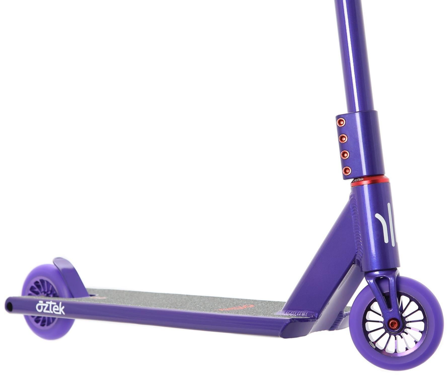 A close-up of the Aztek Architect 2 Complete Stunt Scooter in Viola Purple shows its durable deck, rear wheel, and handlebar details with red bolts and white markings. The Aztek brand on the side makes it perfect for entry-level street riders.