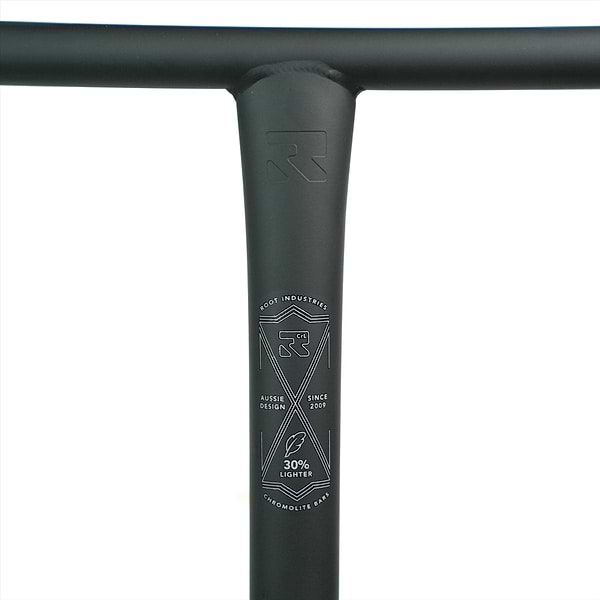 A close-up of the black handlebar stem displays the "Root Industries" logo and text: "Aussie Design," "Since 1200," and "Chromoly Lite Bar, 30% Lighter." The Root Industries ChromoLite Steel Oversized HIC Stunt Scooter T-Bars - Black 620mm x 600mm features a smooth matte finish.