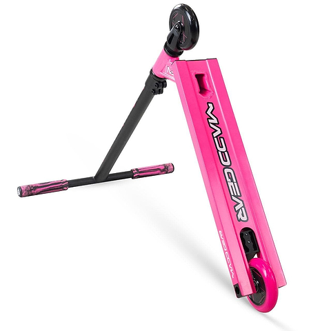 The Madd Gear MG 1 Raven Complete Stunt Scooter in pink/black features black handlebars, pink grips, two pink wheels, and a durable aluminium deck for lightweight performance, as shown from a tilted angle highlighting the front wheel.