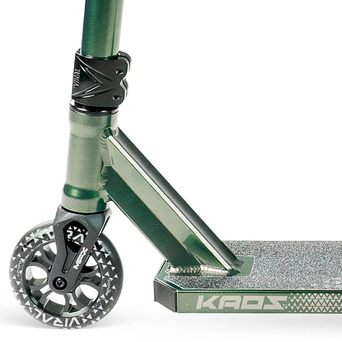 Close-up of the Madd Gear Viral KAOS Complete Stunt Scooter - Forest shows the front wheel, fork, textured footrest, and "KAOS" branded deck—a metallic-finish stunt scooter, ideal for riders progressing their tricks.
