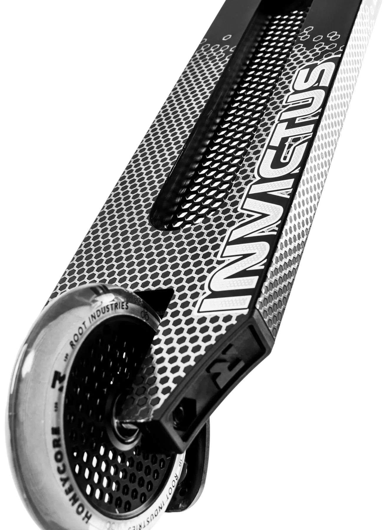 Close-up of the deck and rear wheel of the Root Industries Invictus V3 Complete Stunt Scooter - Black Mirror, showing its honeycomb pattern and "INVICTUS" printed on the deck.