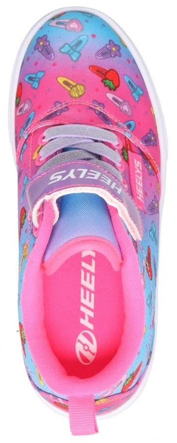 The Heelys Pro 20 X2 Girls Shoes in pink and cyan feature playful heart, star, and fruit patterns, gray laces, a nylon upper, and ABEC 5 bearings for smooth rolling—all set against a vibrant background.