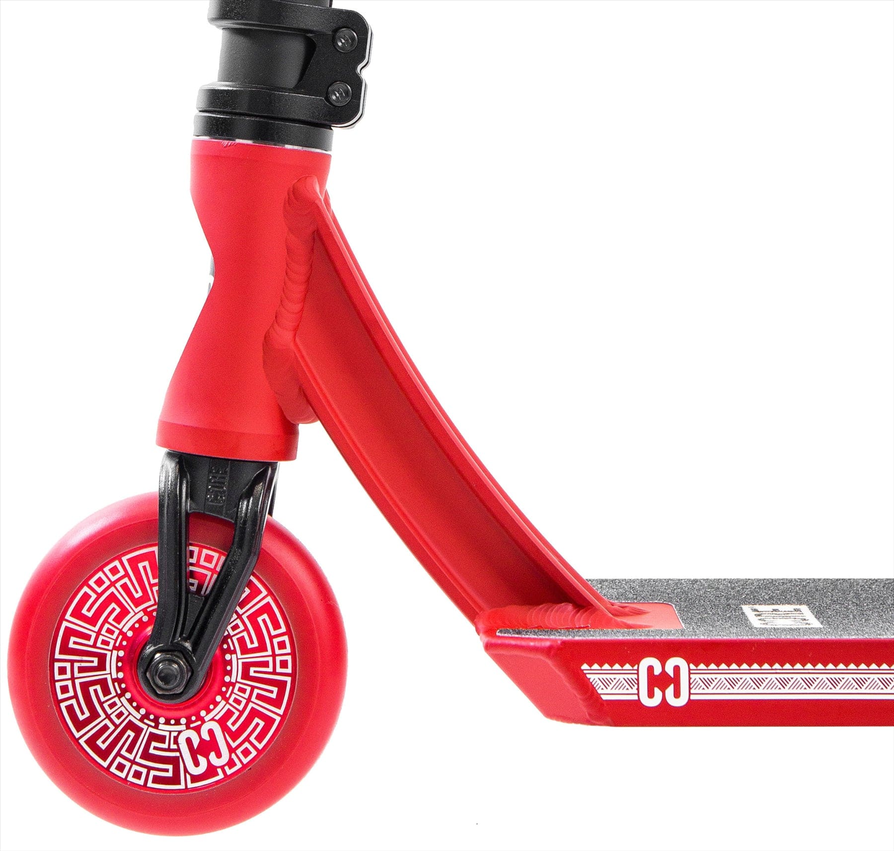 Close-up of the CORE CL1 Complete Stunt Scooter (Black/Red LE) by CORE, featuring its front wheel with a white pattern, part of the deck, handlebars, and a white "C" logo on the deck's side.