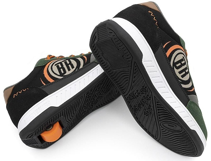The Breezy Rollers Hero 2 Shoes - Black / Green feature black uppers, white soles, orange and green accents, a circular "BH" logo, and Breezy Rollers’ patented retractable wheel system in the heel.