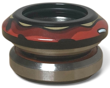 A close-up of the Chubby Doughnut Integrated Stunt Scooter Headset in black and red by Chubby, featuring a metal and plastic construction with sealed bearings, shown isolated on a white background.