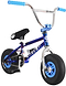 The Wildcat OG Original 3A Mini BMX Bike - Royal Blue by Wildcat features a compact metallic blue frame, PRO Street 65PSI tyres, light blue rims, 4130 chromoly steel handlebars with blue grips, and a black seat with a white graphic—perfect for trick riding.
