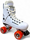 The Supreme Turbo 33 Nylon Quad Roller Skates feature a white boot with red swirl wheels and white laces, displaying the "Supreme" logo on both the boot and wheels, inspired by classic Bauer Turbo 99 skates.
