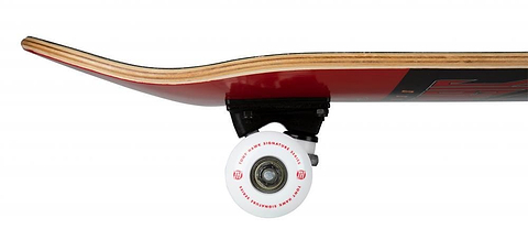 Side view of the Tony Hawk SS 180+ Bird Logo Red Complete Skateboard (8" x 31.5"), showing its red underside, black truck, and a white wheel with red writing, isolated on a white background.