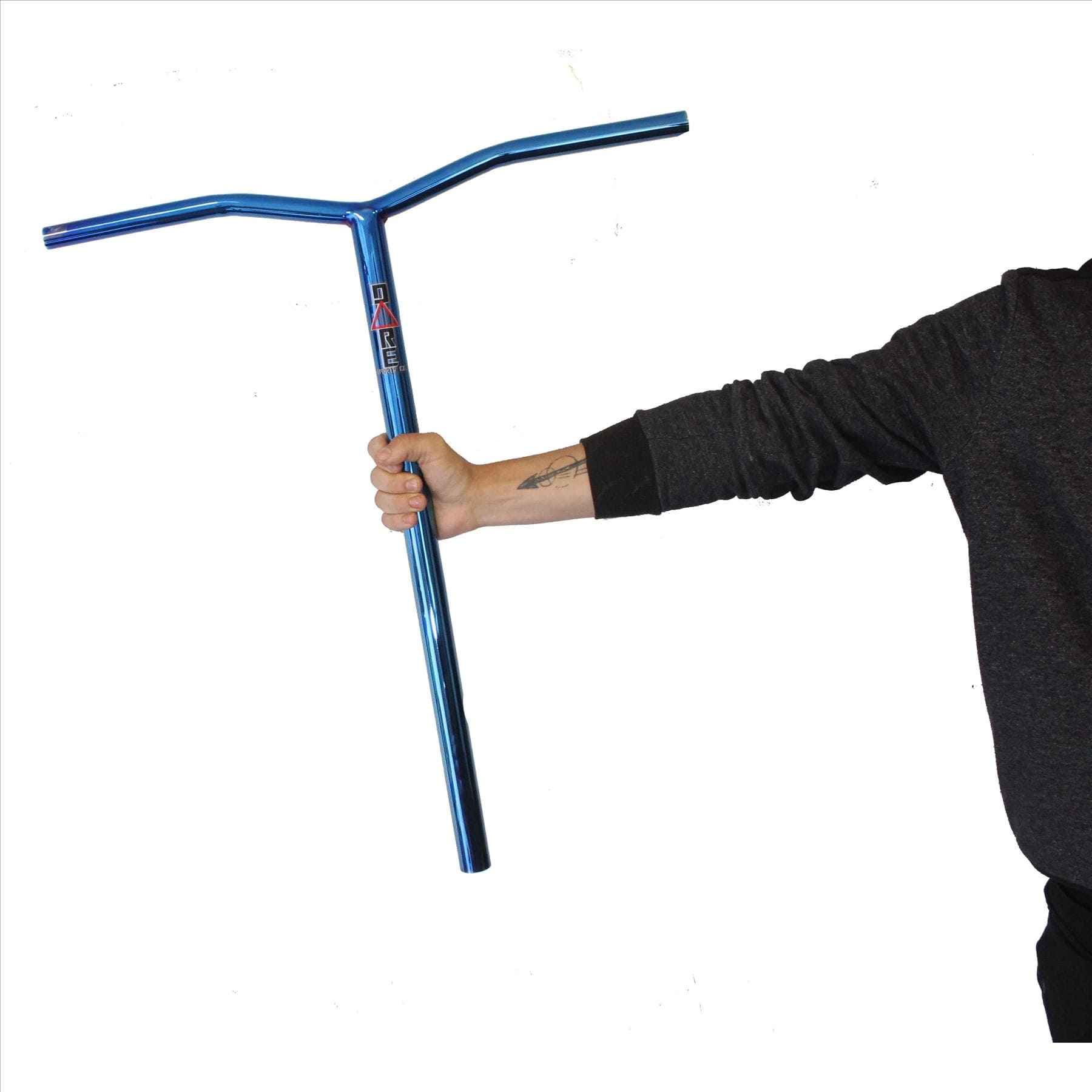 A person in a dark sleeve holds the Dare Wing Steel Standard SCS Stunt Scooter Bars in Blue Chrome (685mm x 610mm) by Dare, designed for taller riders, against a plain white background.