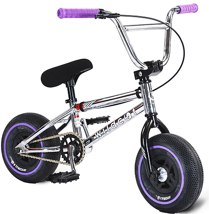 The Wildcat OG 3A Mini BMX Bike – Galaxy Purple features a chrome frame with "WILDCAT" branding, PRO Street 65PSI tires, purple CNC aluminum rims and accents, thick black tires, a black seat, and black pedals.