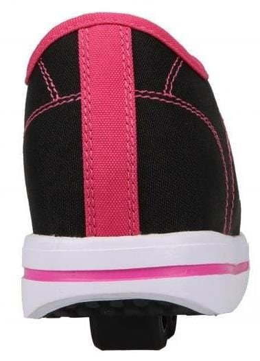 The Heelys Classic X2 Girls Shoes in Black/White/Hot Pink feature pink stitching, a white sole with a pink stripe, low-profile heel wheels, and a durable Canvas/Nylon upper. Shown from the back. Brand: Heelys.