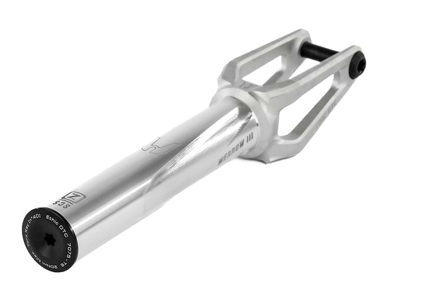 The Ethic DTC Merrow V3 SCS Stunt Scooter Fork by Ethic is crafted from 7075 aluminium in raw silver, featuring a sleek, angular design with a black bolt and laser-etched markings—one of the lightest forks available.