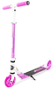 The Madd Gear Metro Rush 125 Kids Foldable Scooter—White/Purple—features two wheels, a black grip deck, purple handlebars and wheels, and an adjustable handlebar for growing kids. Brand: Madd Gear (MGP).