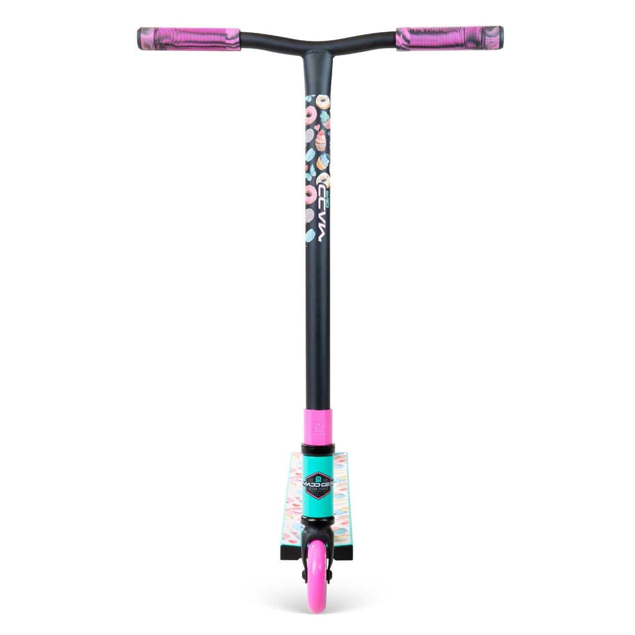 The Madd Gear (MGP) MG 2 Obsidian Complete Stunt Scooter - Sugar Rush for kids 5+ features pink handlebars and wheels, donut graphics on the bar, and a turquoise and pink deck, shown from the front.