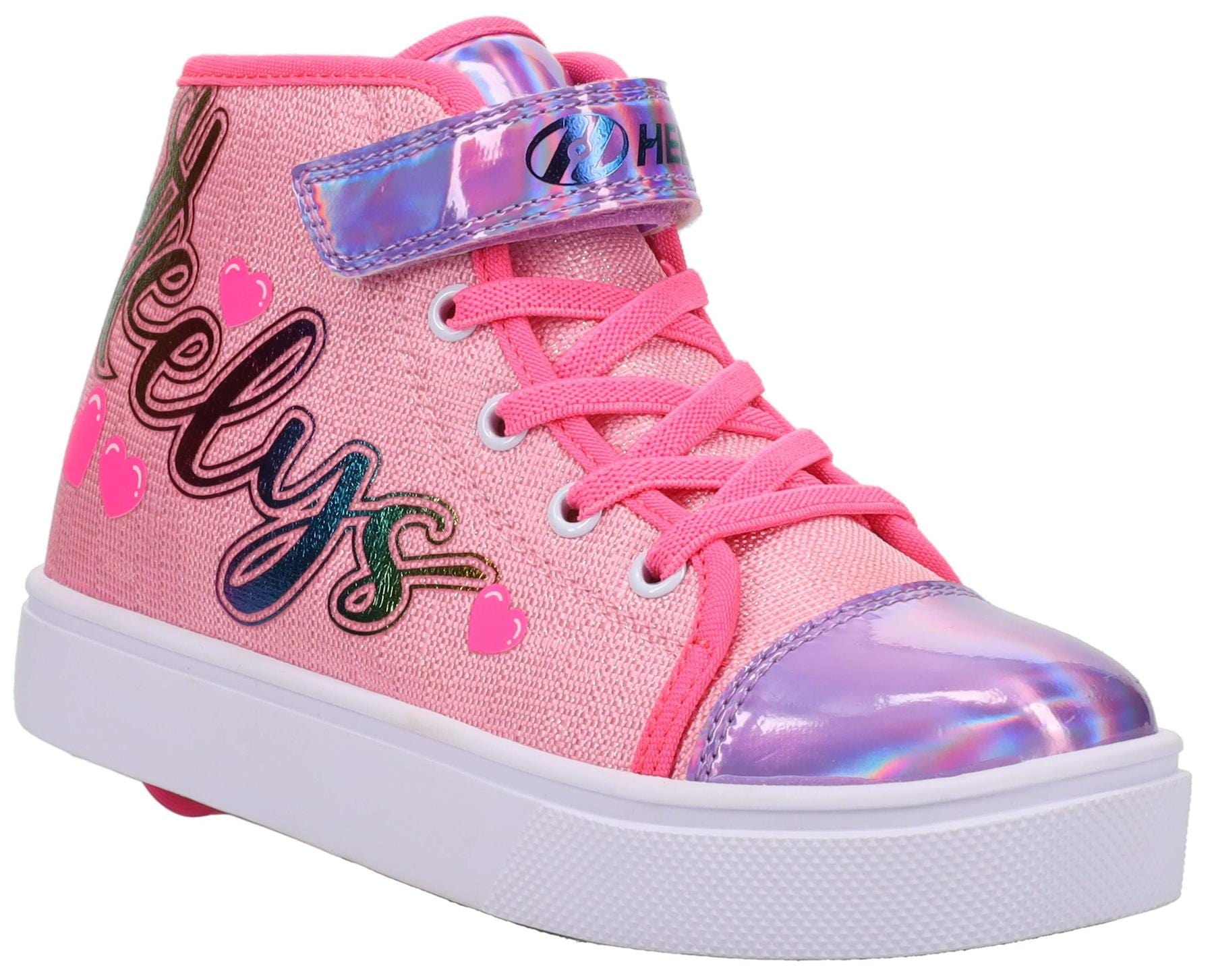 The Heelys Veloz X2 Prints Girls Shoes in Prism Pink/Neon Pink/Multi feature a synthetic upper, shiny purple toe and tongue, pink laces, velcro strap, heart details, "Heelys" logo, white sole, and low-profile wheels in the heel.
