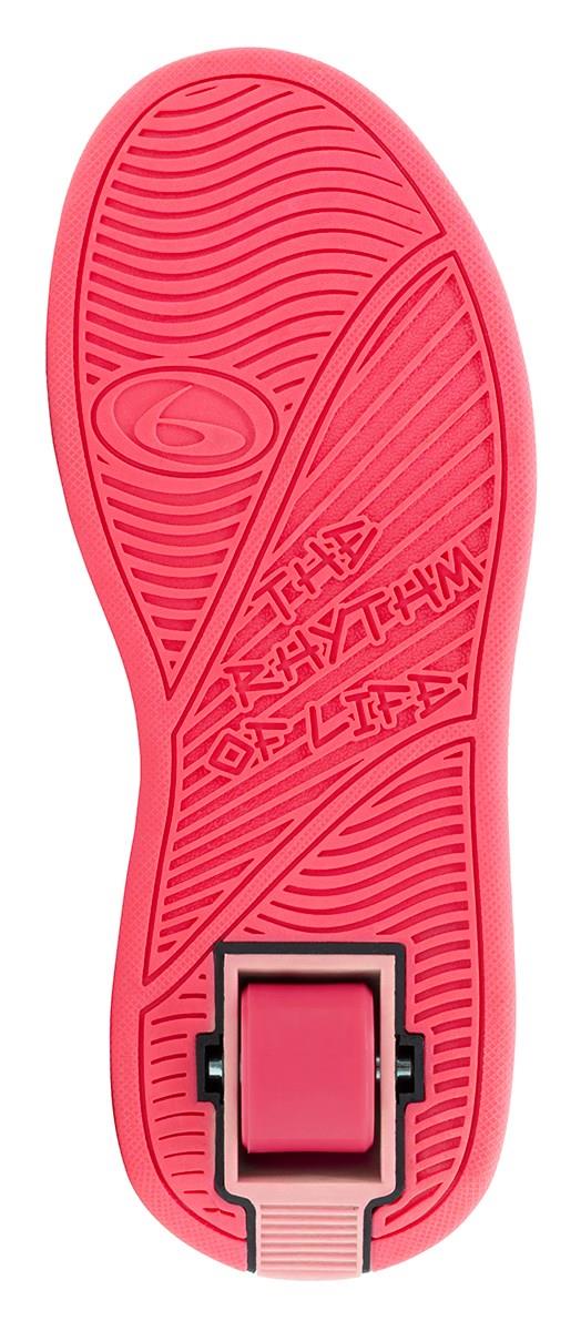 The Breezy Rollers Star Girls Shoes - Pink / Yellow feature a bright sole with wavy tread, the Breezy Rollers logo, and “THE RHYTHM OF LIFE.” A patented retractable wheel near the heel highlights these stylish shoes’ unique design.
