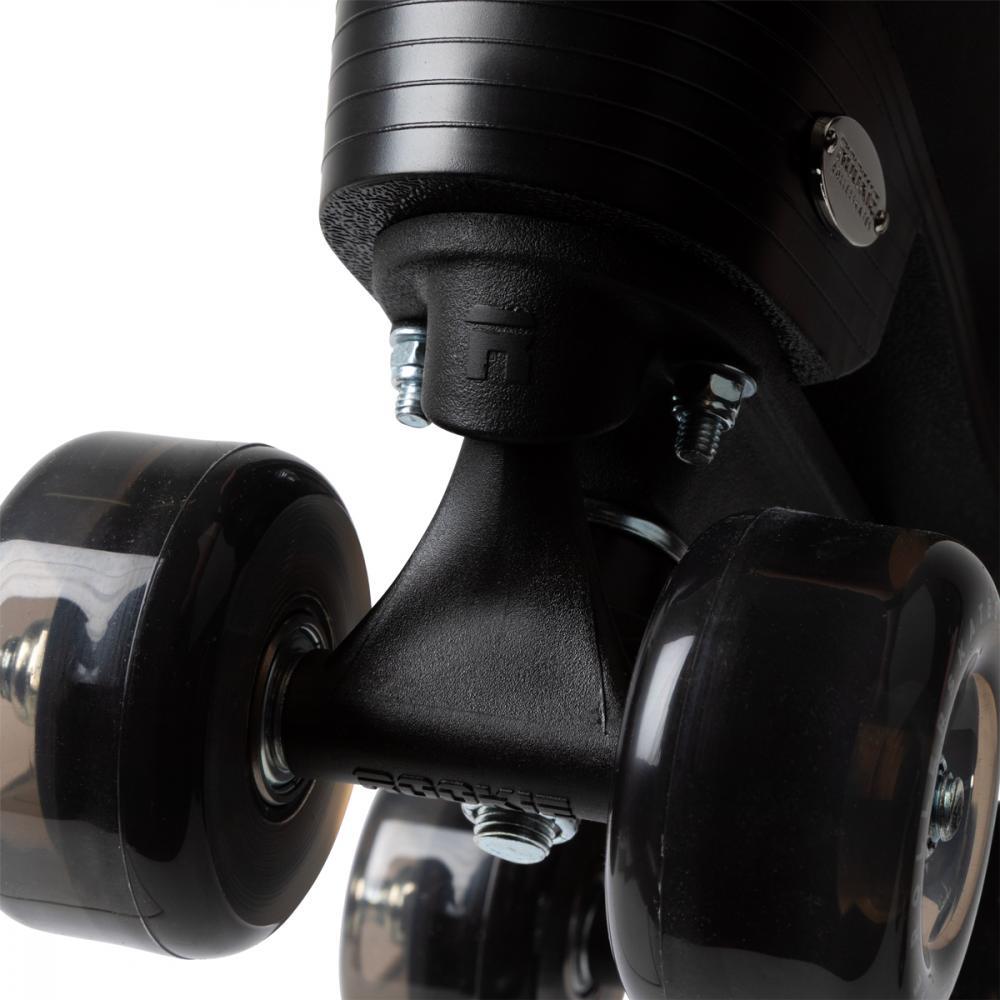Close-up of the underside of Rookie Classic 78 Quad Roller Skates - Black by Rookie, showcasing shiny translucent wheels, sturdy axle, and metal mounting hardware that emphasize the quality construction.