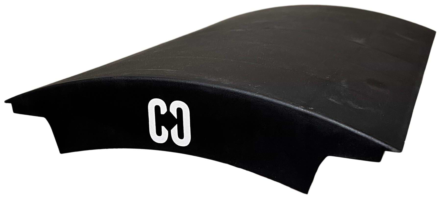 A black, curved plastic CORE Mini Wave Bridge Connector with "CORE" in white on the end—ideal for upgrading your skate setup.