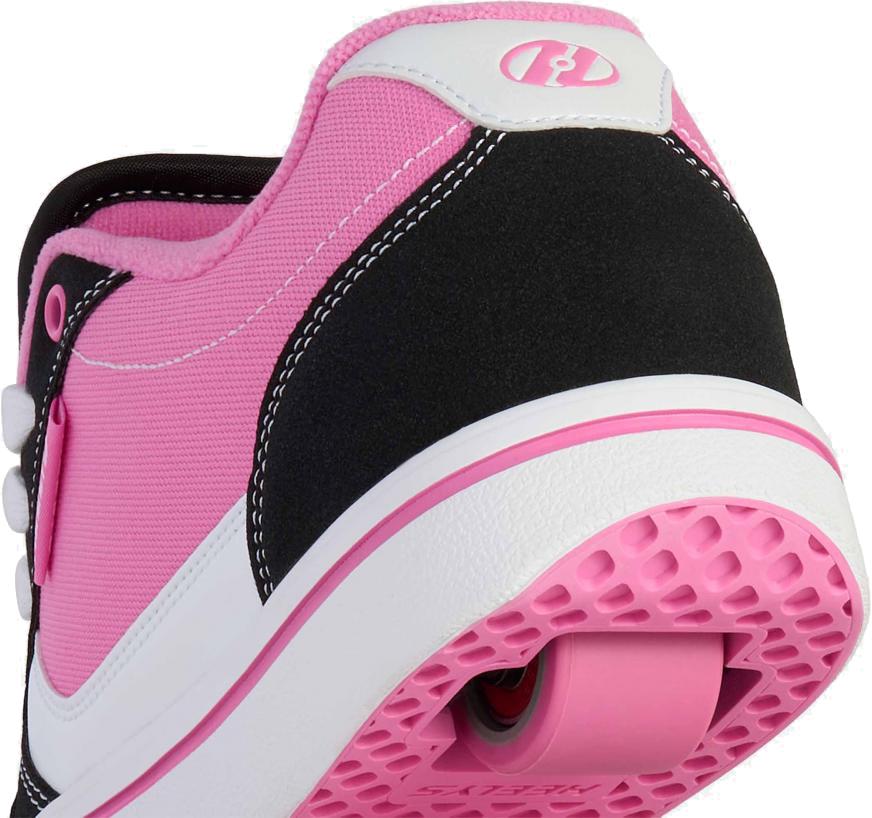 Close-up of the heel on Heelys Pro 25 V2 Girls Shoes by Heelys in black, white, and pink. Featuring a built-in retractable wheel and textured pink sole, these sneakers channel playful retro 90s style.