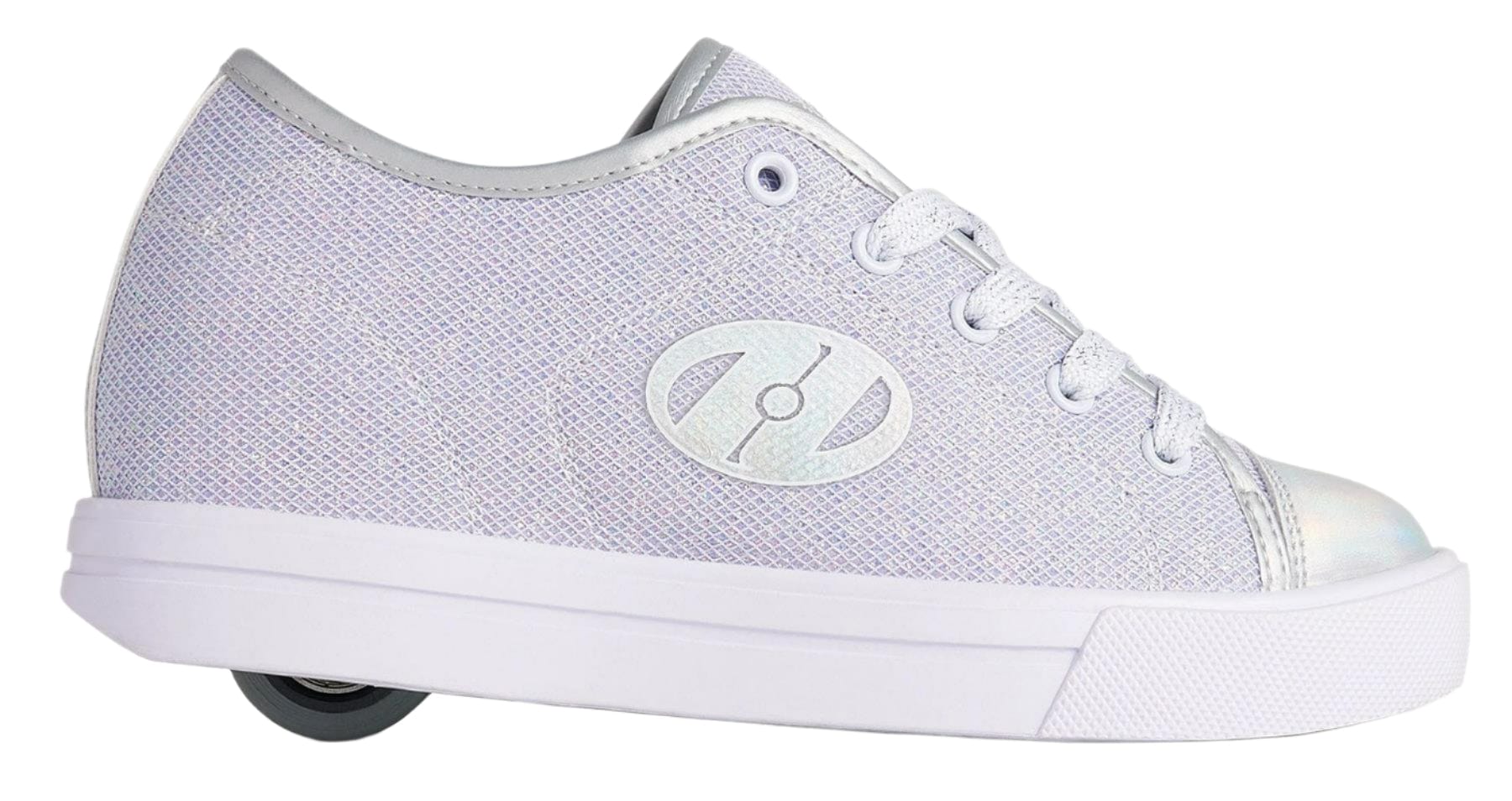 The Heelys Classic Em Girls Shoes in Silver/White/Grey feature a shiny mesh upper, white laces, silver accents, and a single retractable wheel with ABEC 3 bearings—perfect for rolling or walking.