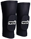 The Revvi Kids Knee MTB Protection Pads in black feature the white Revvi logo, providing impact protection and comfort. Shown upright against a white background.