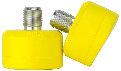 Two Gumball Roller Skate Short 17mm 75A Toe Stops in Lemon Yellow, which resemble gumball toe stops, are shown. One stands upright while the other leans against it, displaying their threaded metallic tops with engraved text—vital tools for improved skating control.
