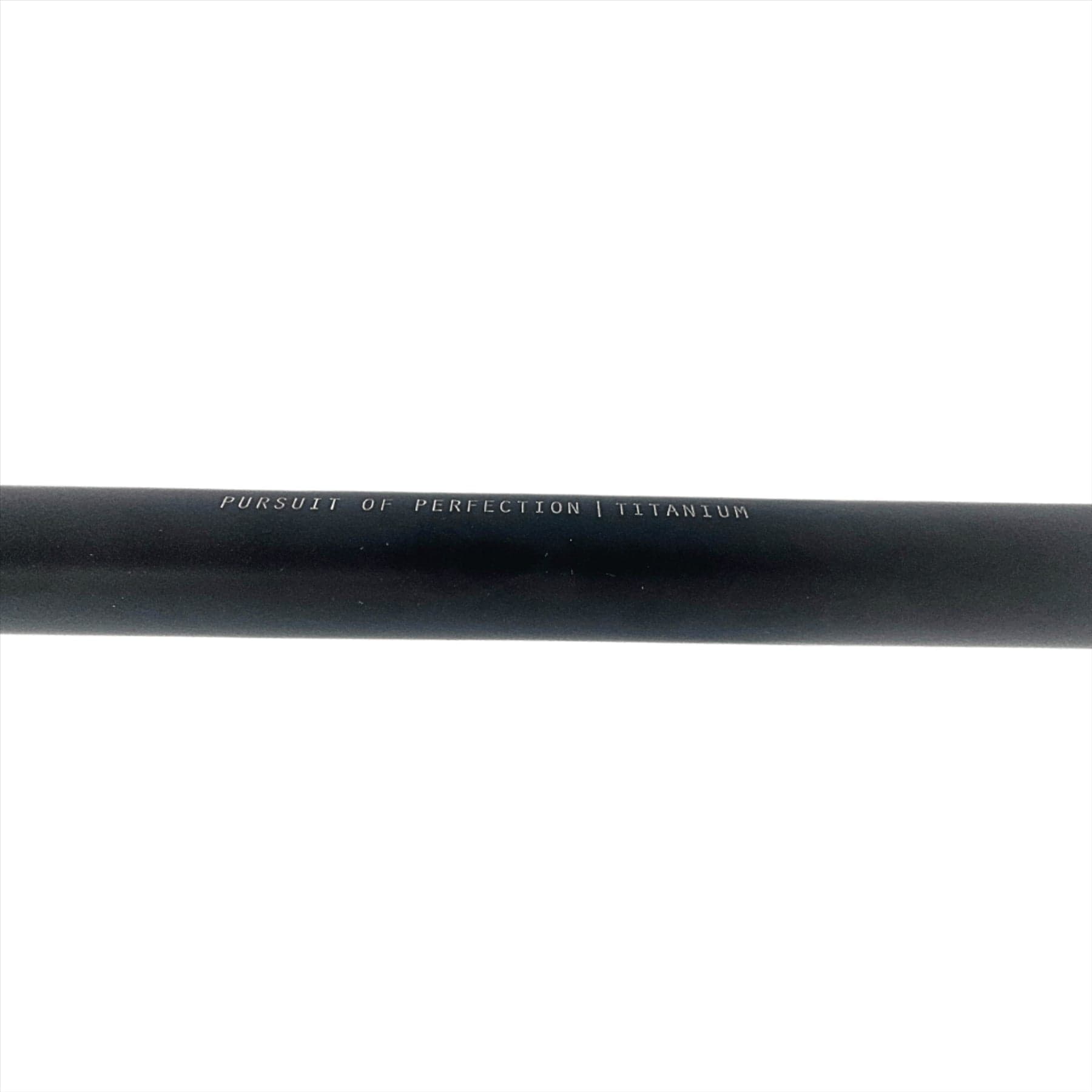 A close-up of Root Industries AIR Titanium Oversized HIC Stunt Scooter T-Bars in black, measuring 690mm x 600mm, showcases the text "Pursuit of Perfection Titanium" engraved on their surface. The plain white background emphasizes the inscription and highlights the sleek design of these lightweight handlebars.
