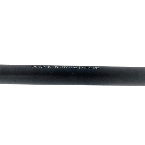 A close-up of Root Industries AIR Titanium Oversized HIC Stunt Scooter T-Bars in black, measuring 690mm x 600mm, showcases the text "Pursuit of Perfection Titanium" engraved on their surface. The plain white background emphasizes the inscription and highlights the sleek design of these lightweight handlebars.
