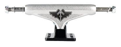 The Fracture Wings V2 Black / Raw Skateboard Trucks (Pair) - 140mm feature a silver aluminum hanger with a black baseplate and logo at its center. Each truck is designed with two axles extending from each side, complemented by 90A bushings for smooth rides.