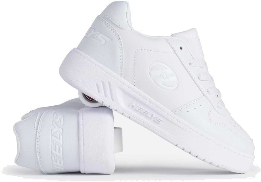 The Heelys Kama Girls Shoes in white are shown with one upright and one on its side, highlighting the low-profile heel wheels. These court-style Heelys shoes feature laces and the iconic Heelys logo.