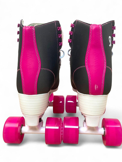 The Supreme Malibu Quad Roller Skates in Black/Pink by Supreme feature white heels and bright pink wheels, shown from the back on a white background—stylish and comfortable skates ideal for outdoor fun.