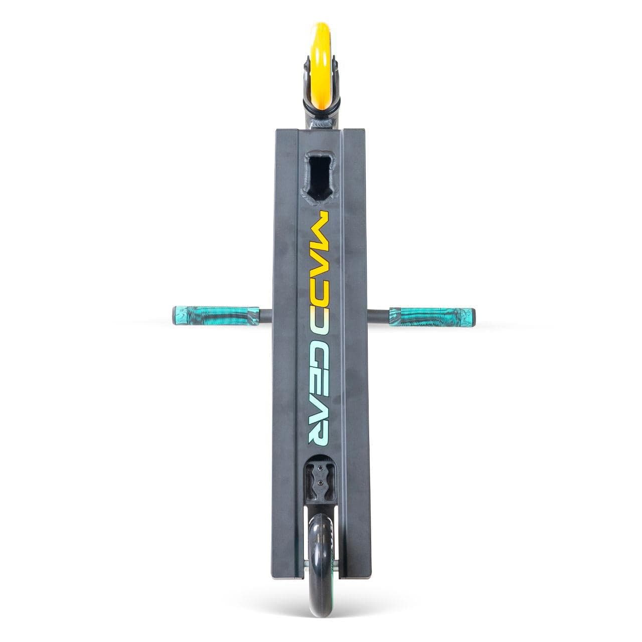 Bottom view of the Madd Gear MG 2 Obsidian Complete Stunt Scooter - DJ Rilla with teal handlebars, yellow front wheel, black rear wheel, and "MAD GEAR" on the deck. High-speed ABEC-5 chrome bearings ensure smooth performance. Brand: Madd Gear (MGP).