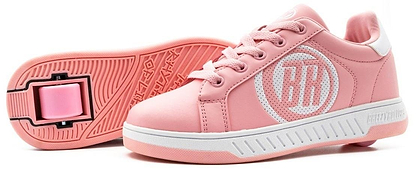 A pair of Breezy Rollers Classic Shoes in pink and white by Breezy Rollers, featuring white soles, laces, a perforated circle on the side, and a patented heel wheel system for smooth rolling wherever you go.