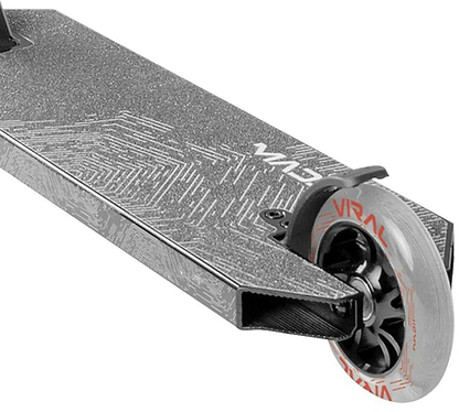 Close-up of the rear section of the Madd Gear Viral Extreme Stunt Scooter in Black Shadow, showing a textured deck, black brake, and translucent rear wheel with red “Viral” branding—ideal for skatepark setups.