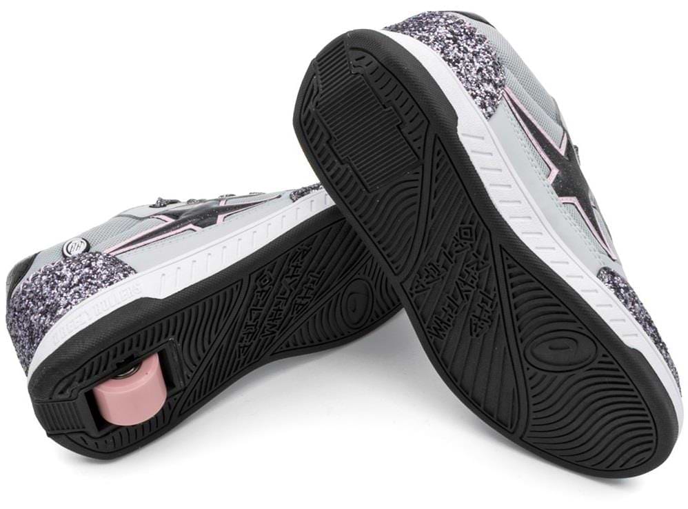 Breezy Rollers Star Shoes - Silver/Grey by Breezy Rollers feature black soles, glittery purple accents, a star design on the side, and a patented pink wheel in one heel for rolling fun.