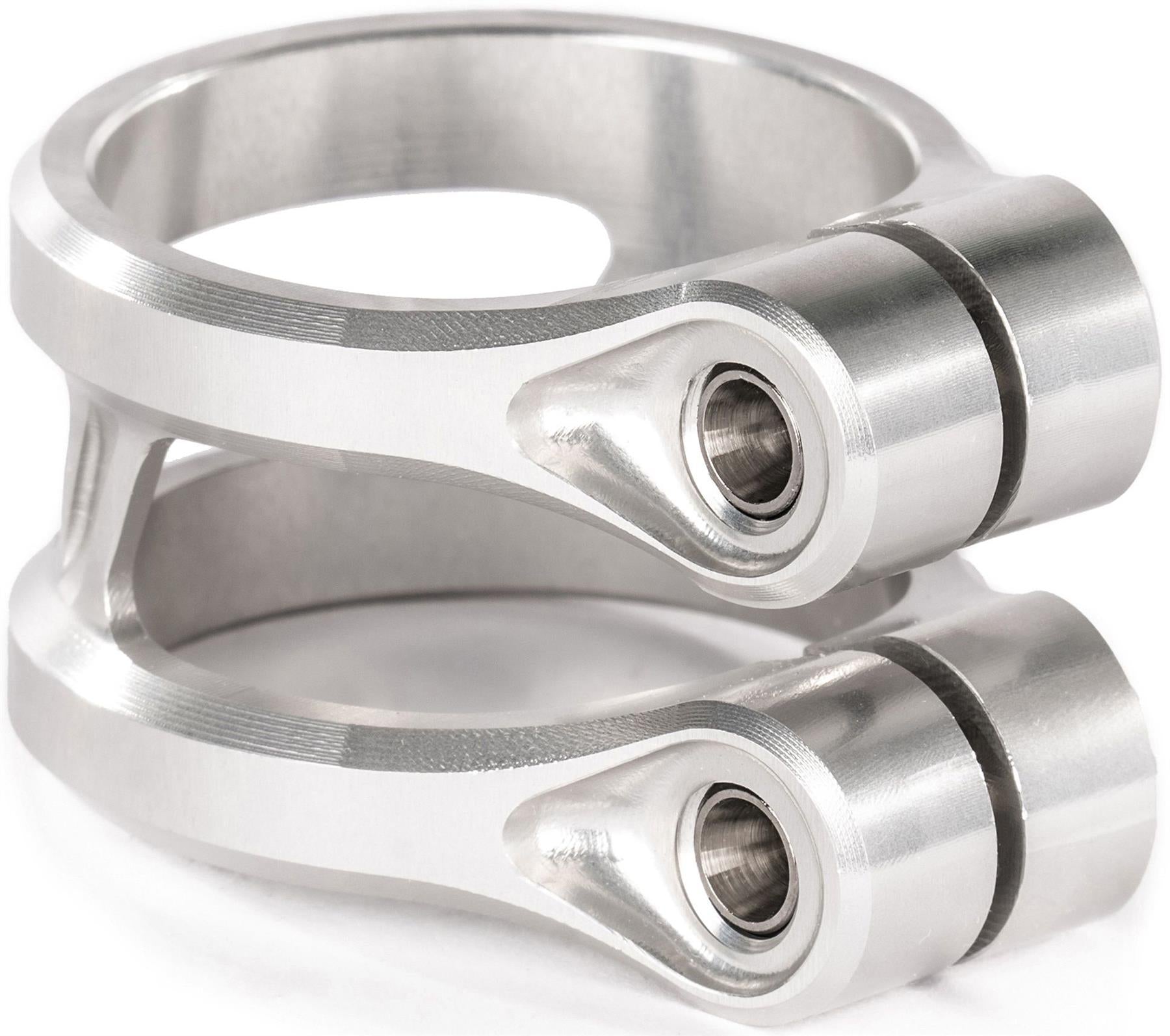 Two stacked silver metal rings with bolt holes, likely for industrial use, resemble the Ethic DTC Sylphe V2 2 Bolt Oversized Stunt Scooter Clamp - Raw by Ethic, shown on a white background.