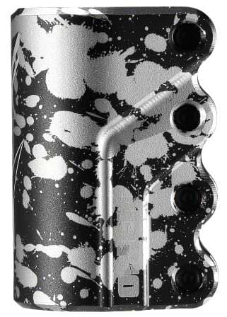 The Blunt Envy Omen 4 Bolt Oversized SCS Stunt Scooter Clamp - Splatter features a black and silver metallic finish with splatter paint, three round holes on the right, and a center grooved pattern for SCS compression.