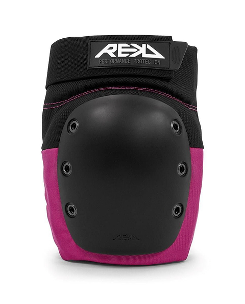 The REKD Ramp Knee Skate Protection Pads in black and pink boast a hard, rounded protective shell for excellent impact resistance. Ideal for action sports, they feature the brand name "REKD" prominently on the top strap, while ventilation rivets enhance comfort during high-intensity activities.