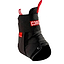 The CORE Ankle Protection Brace - Black by CORE showcases a sleek black and red design, complete with adjustable straps and a Velcro pull tab. Its angular build provides optimal ankle support and protection during skateboarding activities.