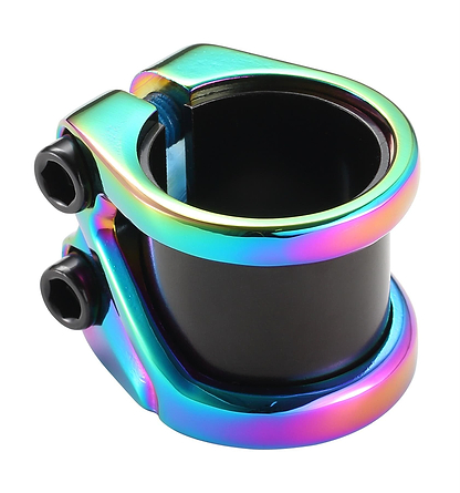A close-up of the Blunt Envy Z 2 Bolt Oversized Stunt Scooter Clamp in Oil Slick Neochrome reveals its rainbow-colored, metallic finish. This aluminum clamp is designed for IHC or HIC bars and features two black screws along with a cylindrical shape, reflecting light in vibrant hues.