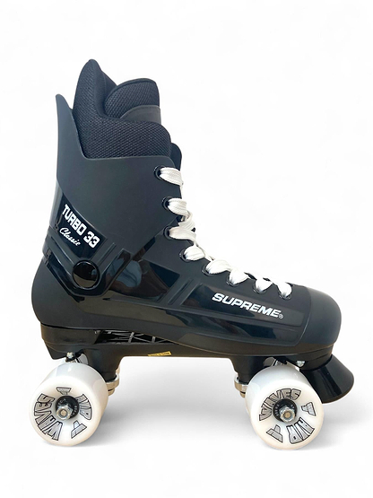 The Supreme Turbo 33 Nylon Quad Roller Skates feature a black and white retro design with white wheels, padded ankle support, and "Classic" printed on the side—offering an iconic take on Supreme's classic quad skates.