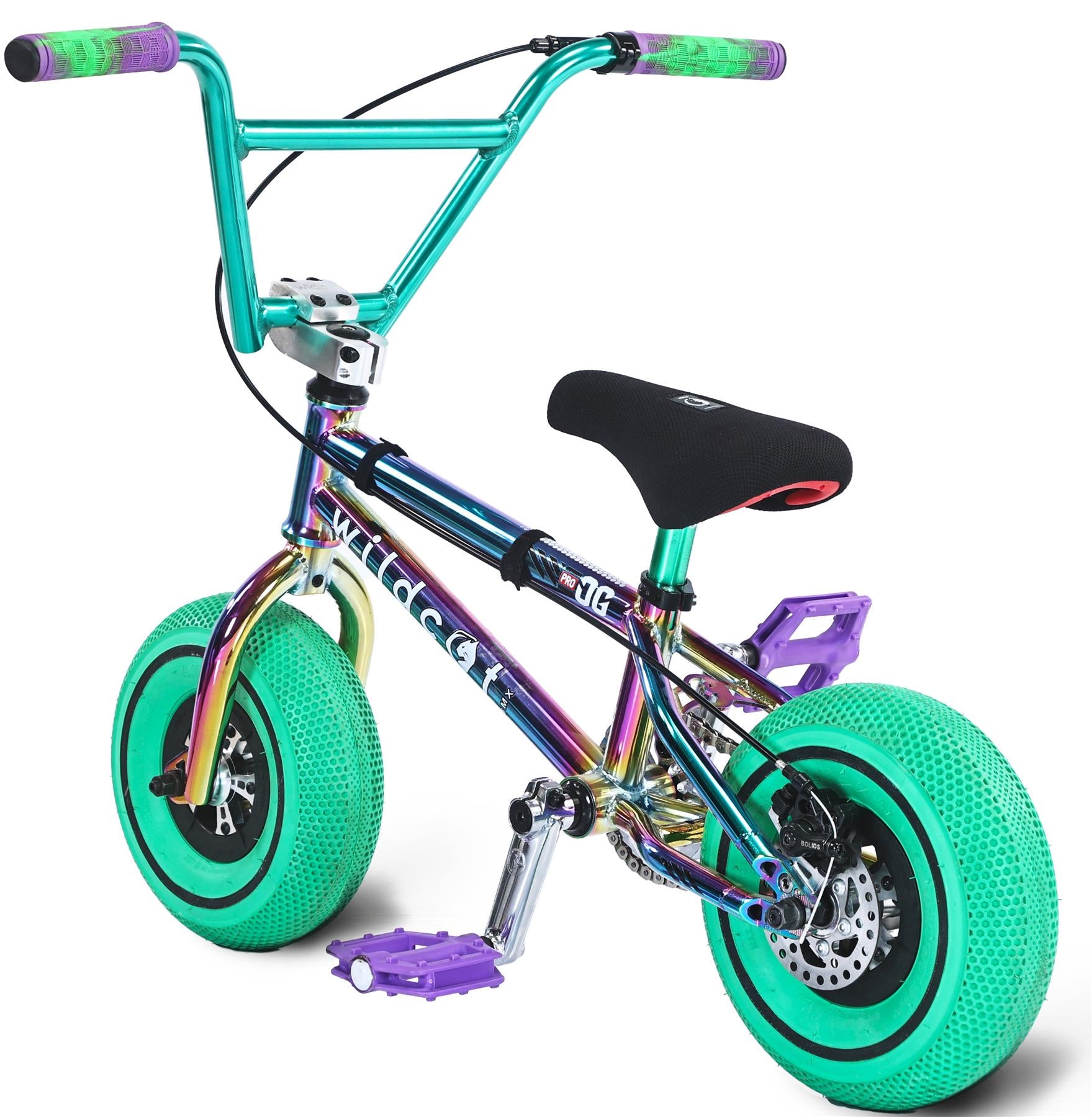 The Wildcat OG Pro Mini BMX Bike - Joker Green by Wildcat features a metallic frame, bright green thick tires, purple pedals, green handlebar grips, a black seat, and turbo wheels—shown angled from the front left side.