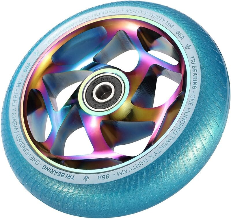 The Blunt Envy Tri-Bearing 120mm x 30mm Scooter Wheel in Neochrome and Teal showcases a striking design with a teal rubber tire and an iridescent metallic core. Its Tri-Bearing feature, along with the "120 X 30 MM" inscription, guarantees improved control and enhanced bearing longevity for a smoother ride.
