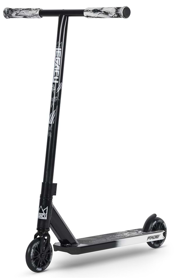 The Legacy Fade Complete Stunt Scooter by Legacy features a black and grey design with white graphics, wide patterned grips, small black wheels, and a flat "FAZE"-labeled deck—ideal for beginners at the skatepark. Photographed on a white background.