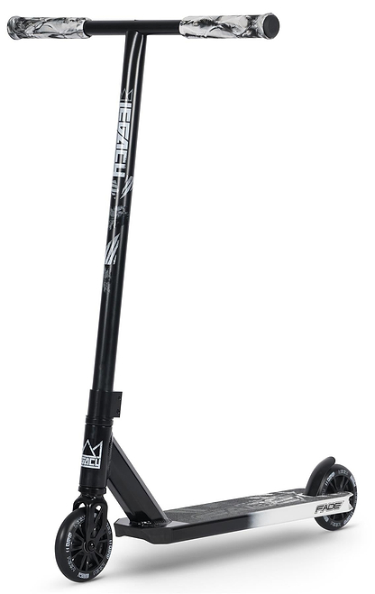 The Legacy Fade Black / Grey Stunt Scooter Starter Bundle by Legacy features a black T-shaped handlebar, patterned grips, small black wheels, and “FAZE” branding on the deck. It stands upright against a plain white background.