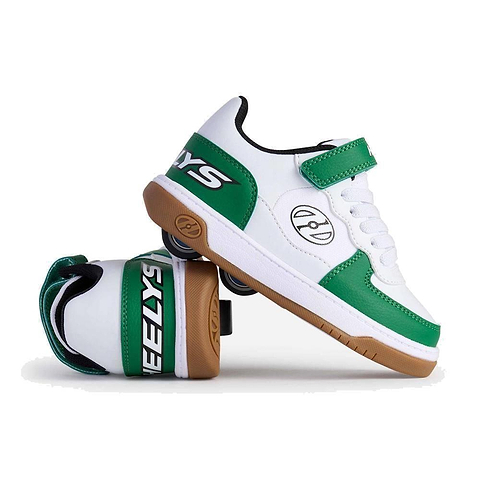 A pair of Heelys Rezerve Low X2 Boys Shoes in white, green, and gum with a two-wheel design. One shoe stands upright while the other is on its side, showing the Heelys logo on the heel and wheels in the soles.