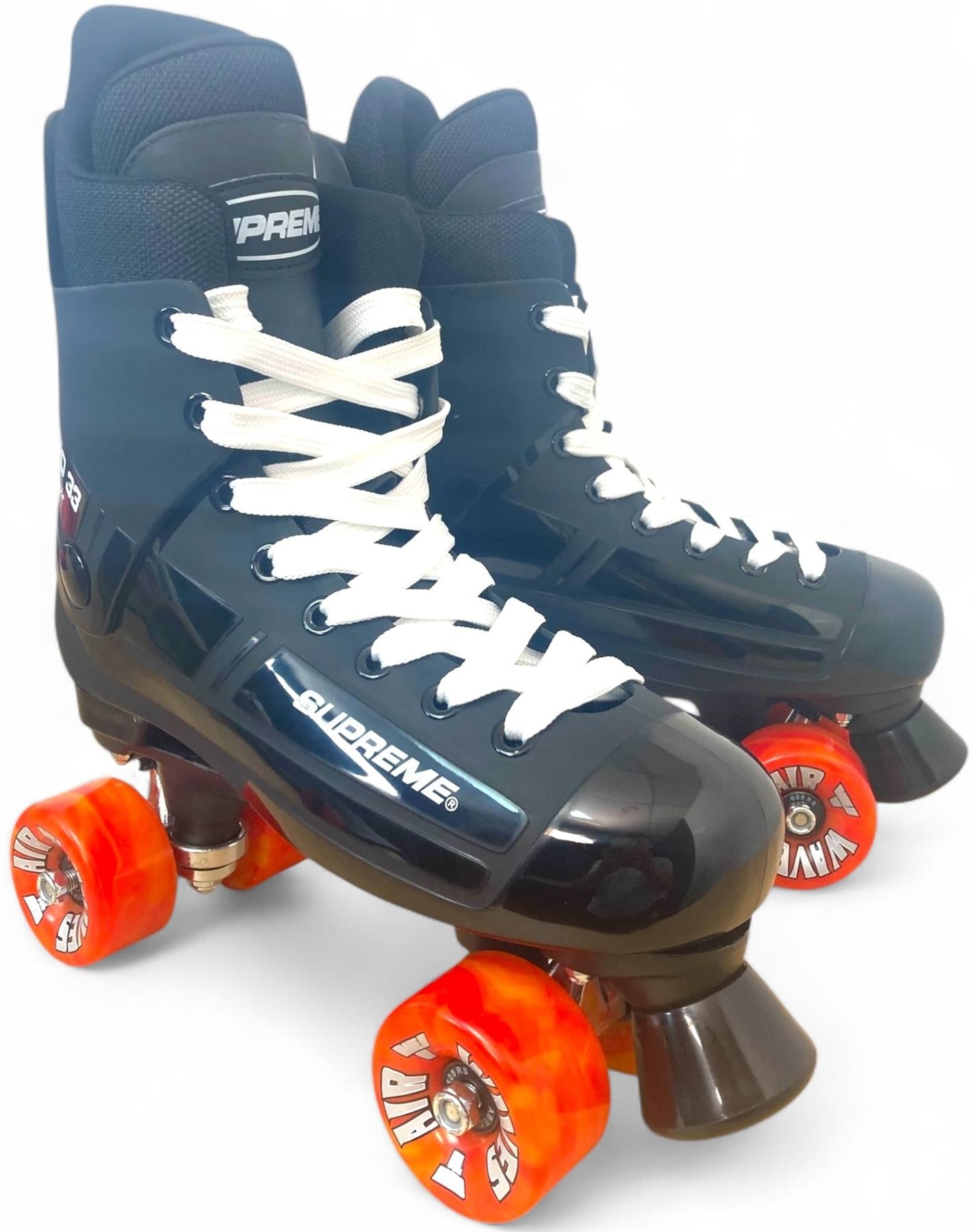 The Supreme Turbo 33 Nylon Quad Roller Skates feature a black nylon design with red swirl wheels and “SUPREME” branding, inspired by the classic Supreme Turbo 33, shown against a plain white background.