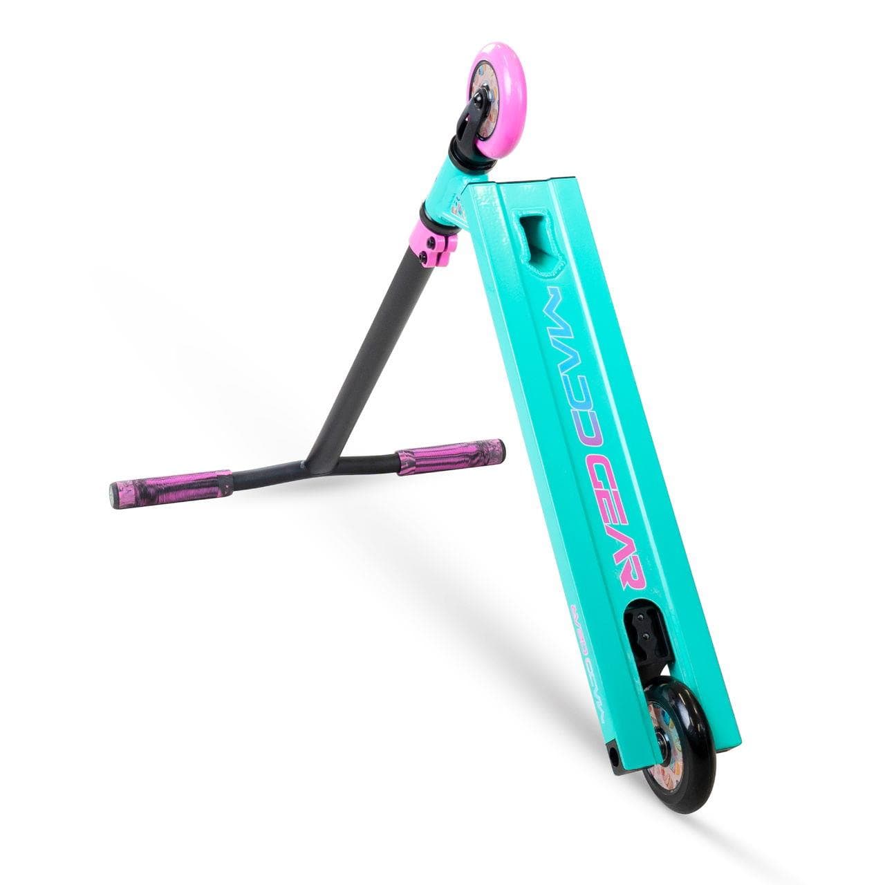 The Madd Gear (MGP) MG 2 Obsidian Complete Stunt Scooter - Sugar Rush features a turquoise and pink deck, black handlebars with purple grips, and pink wheels—ideal for kids 5+, shown against a clean white background.