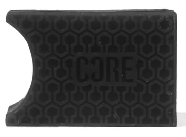 A rectangular block of Liquorice Black skate wax by CORE, made of rubber and featuring a hexagonal pattern on its surface with "CORE Epic Skate Wax" embossed in the center. It has a semi-circular cutout in the left corner, perfect for pre-grooved shapes.